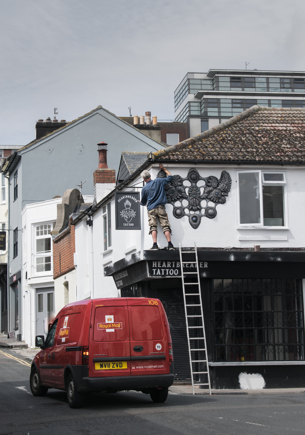 a painter up a ladder